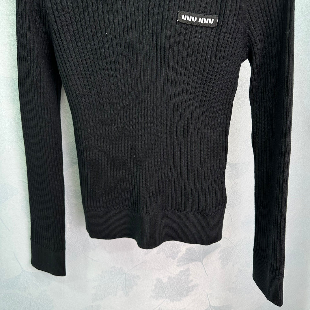 Ribbed High-Neck Wool Sweater